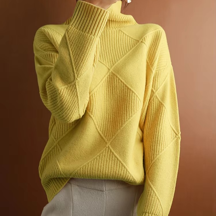 Women's oversized turtleneck knit sweater in cozy soft acrylic blend with relaxed pullover silhouette