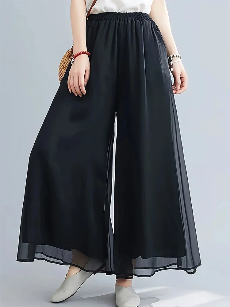 Women's sheer mesh chiffon flare pants double-layer design with delicate sheer hem overlay