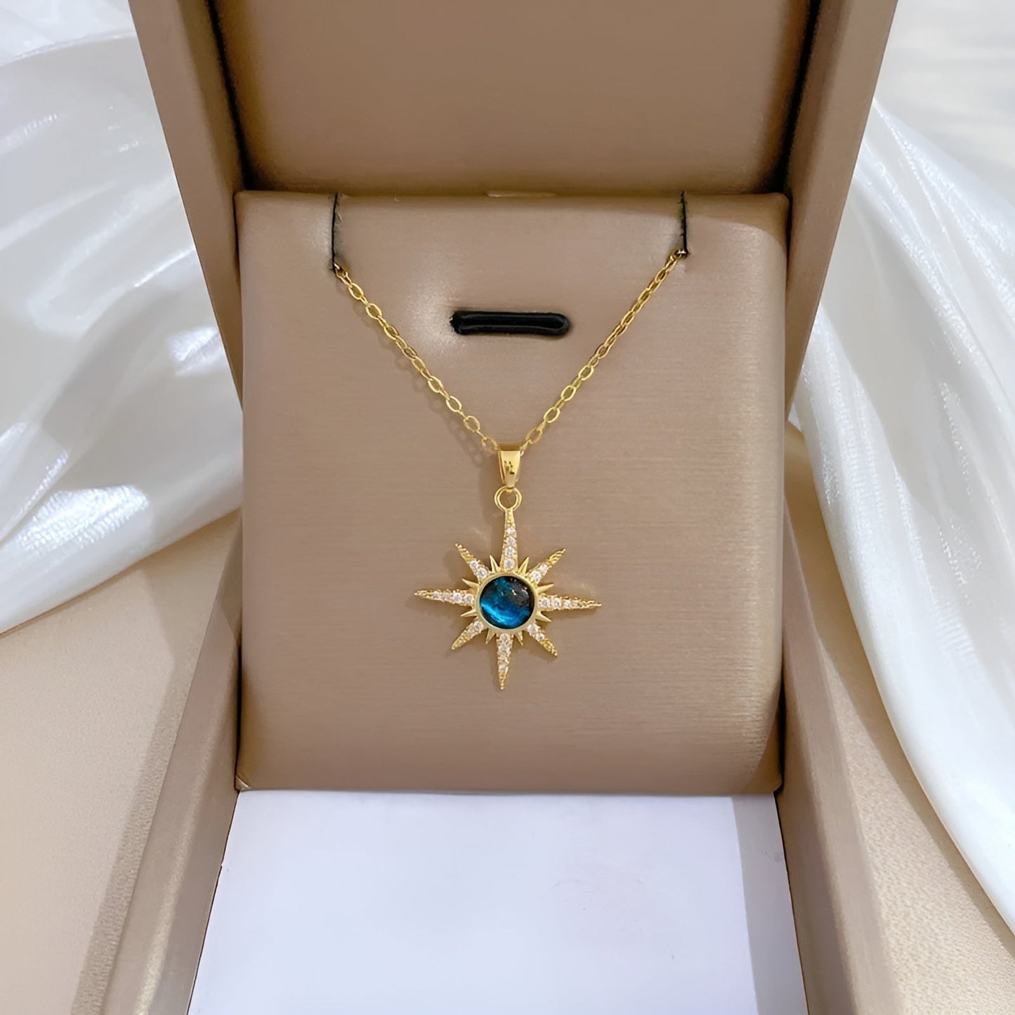 Celestial gold necklace with aquamarine gemstone, crystal accents on tarnish-resistant gold-plated stainless steel