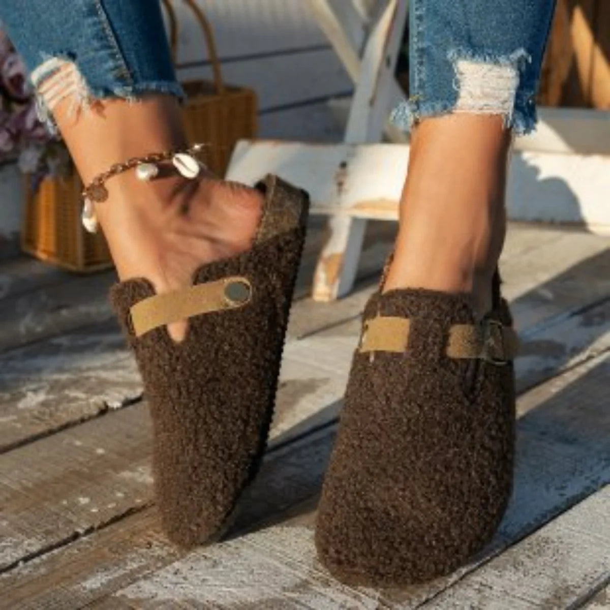 Women's cozy slip-on slippers with ultra-soft plush interior lining for warm indoor relaxation