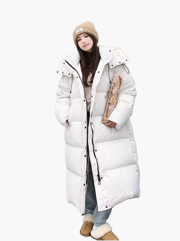 Women's long hooded quilted puffer coat in classic winter style with full-length coverage