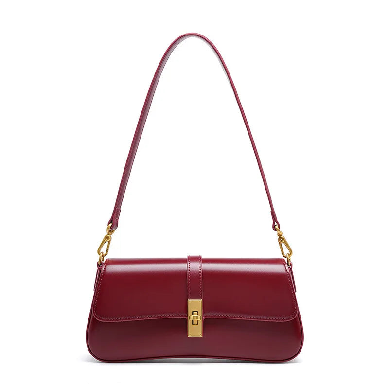 Women's genuine leather shoulder bag with gold hardware, versatile crossbody strap, compact timeless design