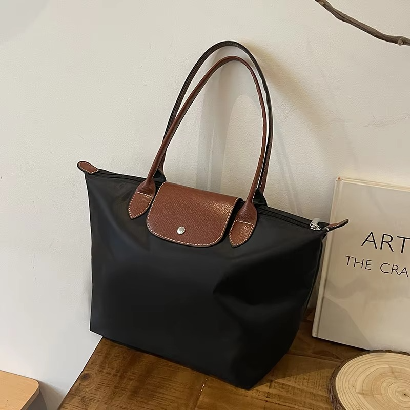Minimalist nylon shoulder tote bag for women, large capacity with reinforced strap, sleek everyday style