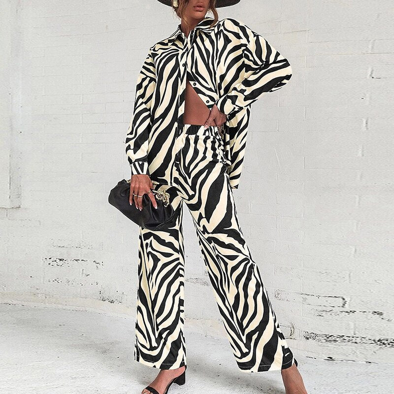 Women's two-piece abstract printed blouse set elegant long top with matching pants modern chic