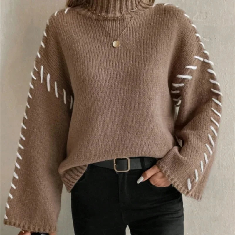 Carmine red knit pullover sweater high neck relaxed fit contrast sleeve detail winter essential