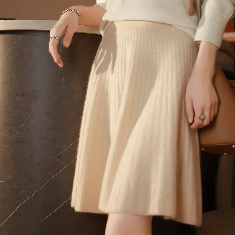 Women's brushed wool ribbed knit skirt with subtle pleated flare, soft cozy fit