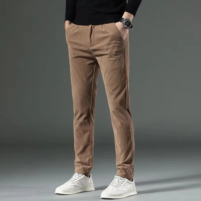 Men's brown fine-wale corduroy stretch dress pants with refined tailored silhouette