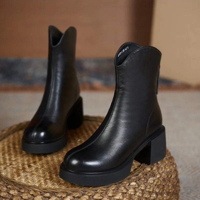 Women's black vegan leather Chelsea boots with chunky block heel and timeless silhouette