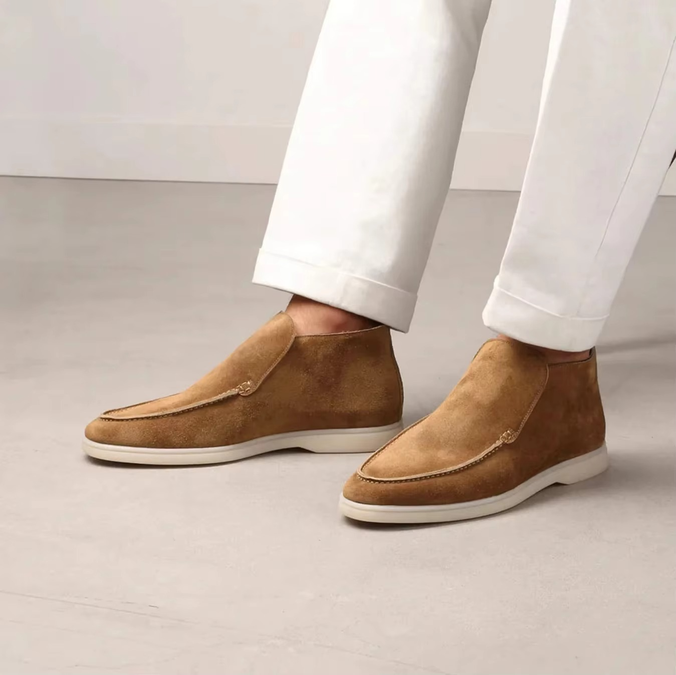Men's brown suede leather slip-on loafers with flexible rubber sole, classic moccasin driving style