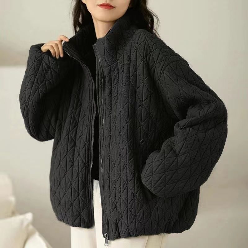 Women's classic warm coat soft texture sustainable materials cozy silhouette everyday outerwear