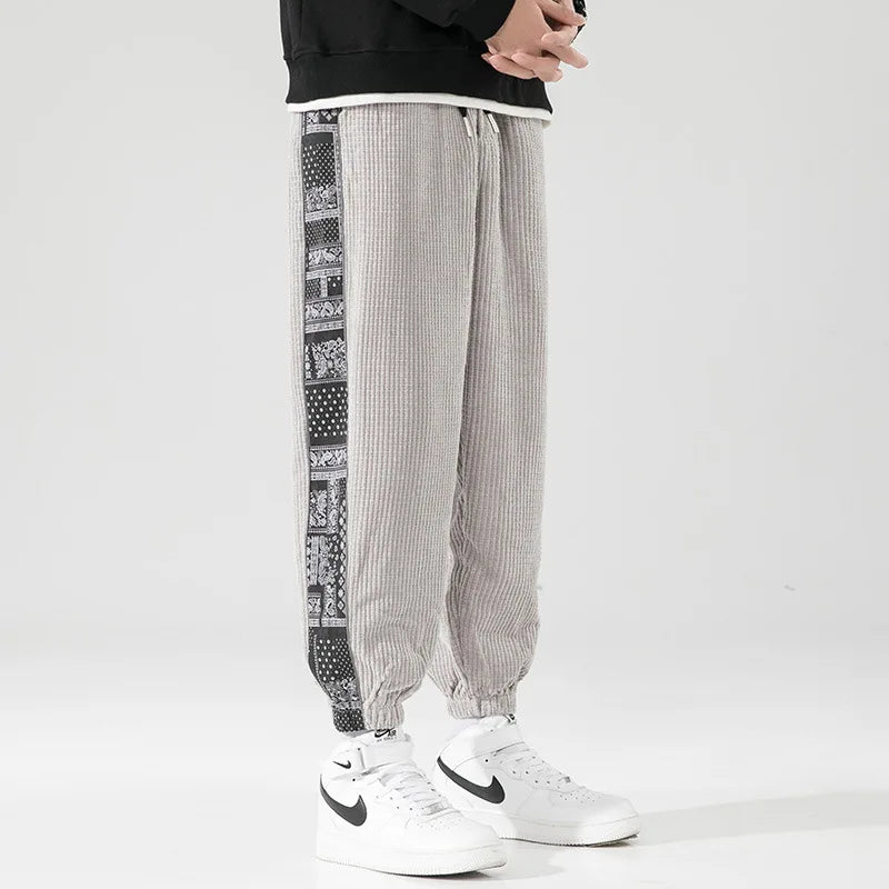 Relaxed fit corduroy sweatpants with paisley bandana side detailing, 90s streetwear inspired