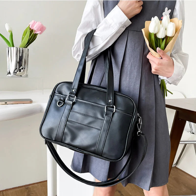 Women's vegan PU leather shoulder bag with star studs, adjustable strap, modern elegant style