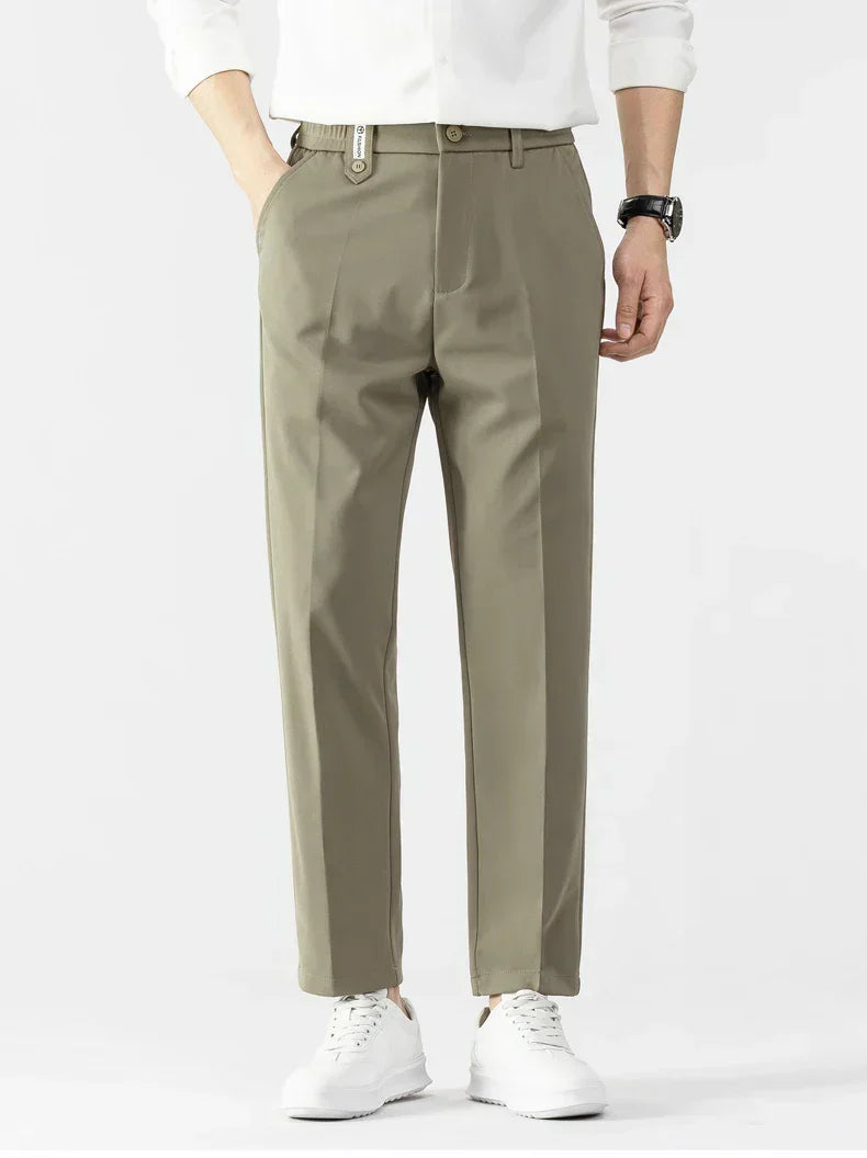 Men's slim fit lightweight dress pants in neutral tone, tailored cut for all-day office comfort