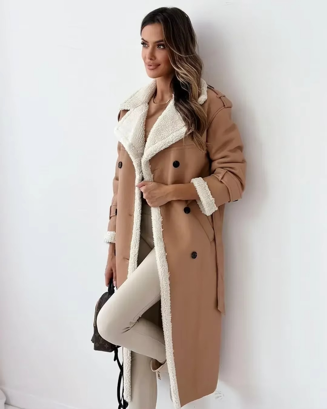 Women's black PU leather double-breasted trench coat with stand collar and plush interior lining