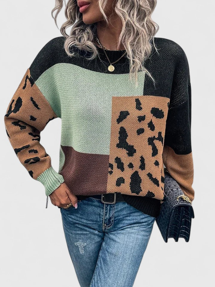 Colorblock patchwork knit sweater in warm earthy tones with relaxed fit and bold block panels