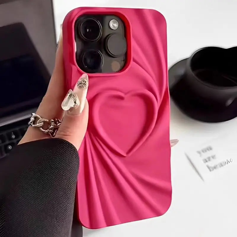 Ultra-slim matte silicone iPhone case with 3D sculpted folded heart design, full coverage protection for women