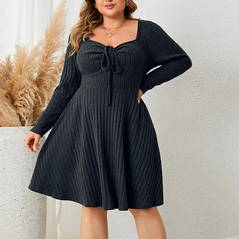 Plus size ribbed soft knit dress with lace-up neckline, all-way stretch, curve-flattering silhouette