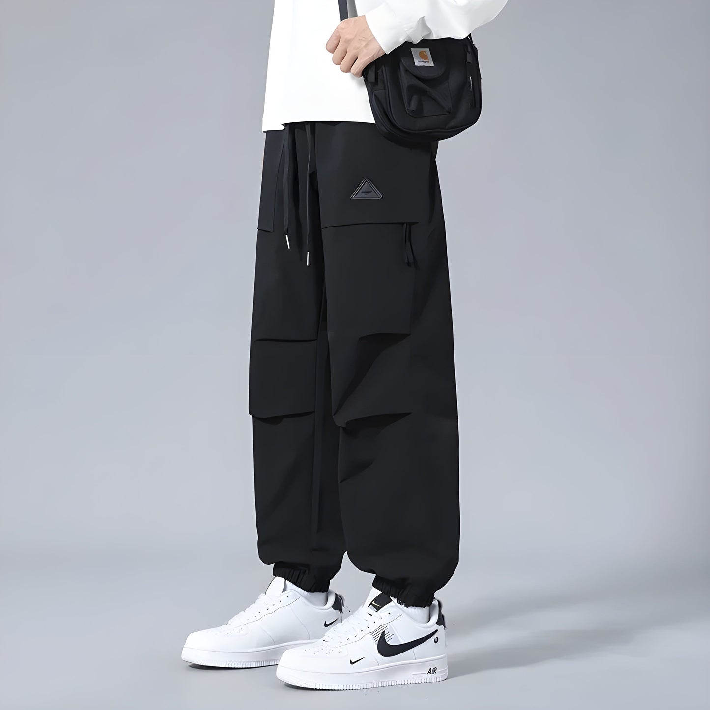 Men's relaxed fit cargo pants with elastic drawstring waist, utility style, multiple cargo pockets
