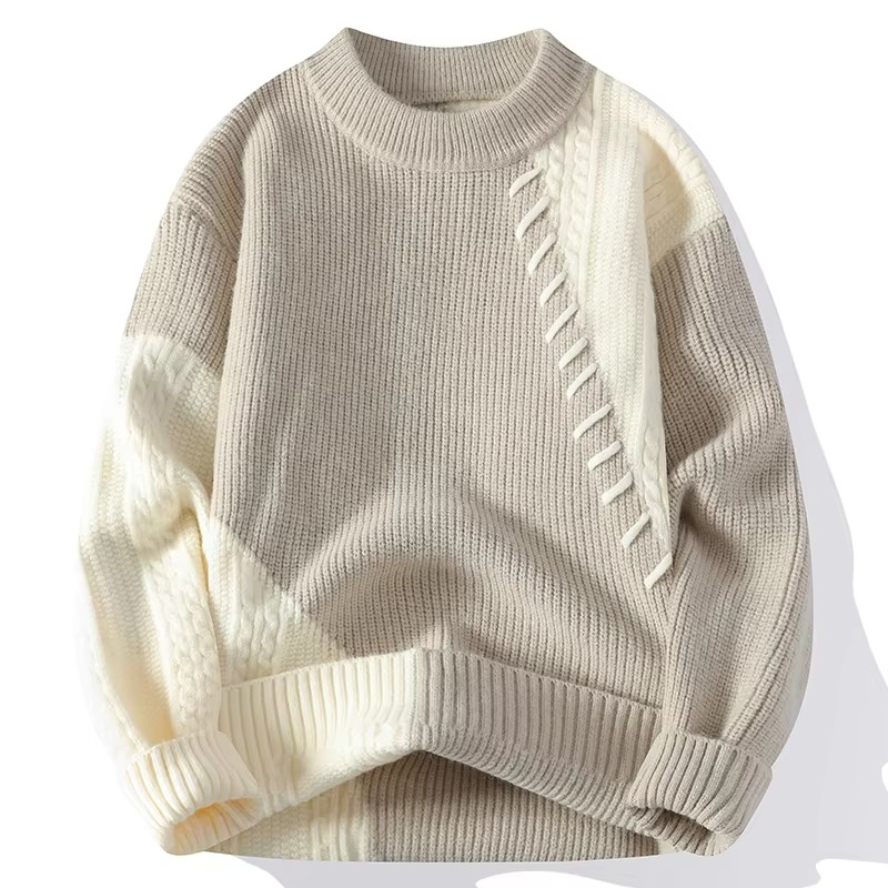 Men's patchwork knit crew neck pullover sweater with contrast diagonal panels and decorative stitching