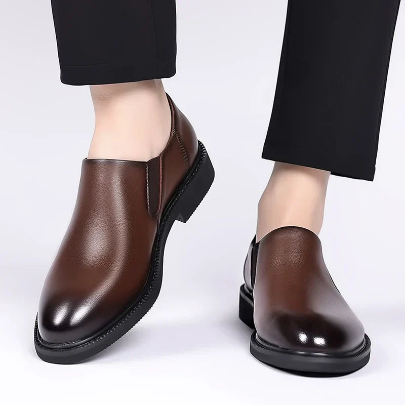 Men's black leather Oxford dress shoes classic brogue detailing polished formal style for professionals