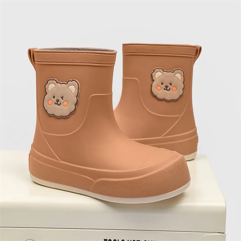 Women's ankle-height waterproof rubber rain boots in bear motif pull-on style for urban wear