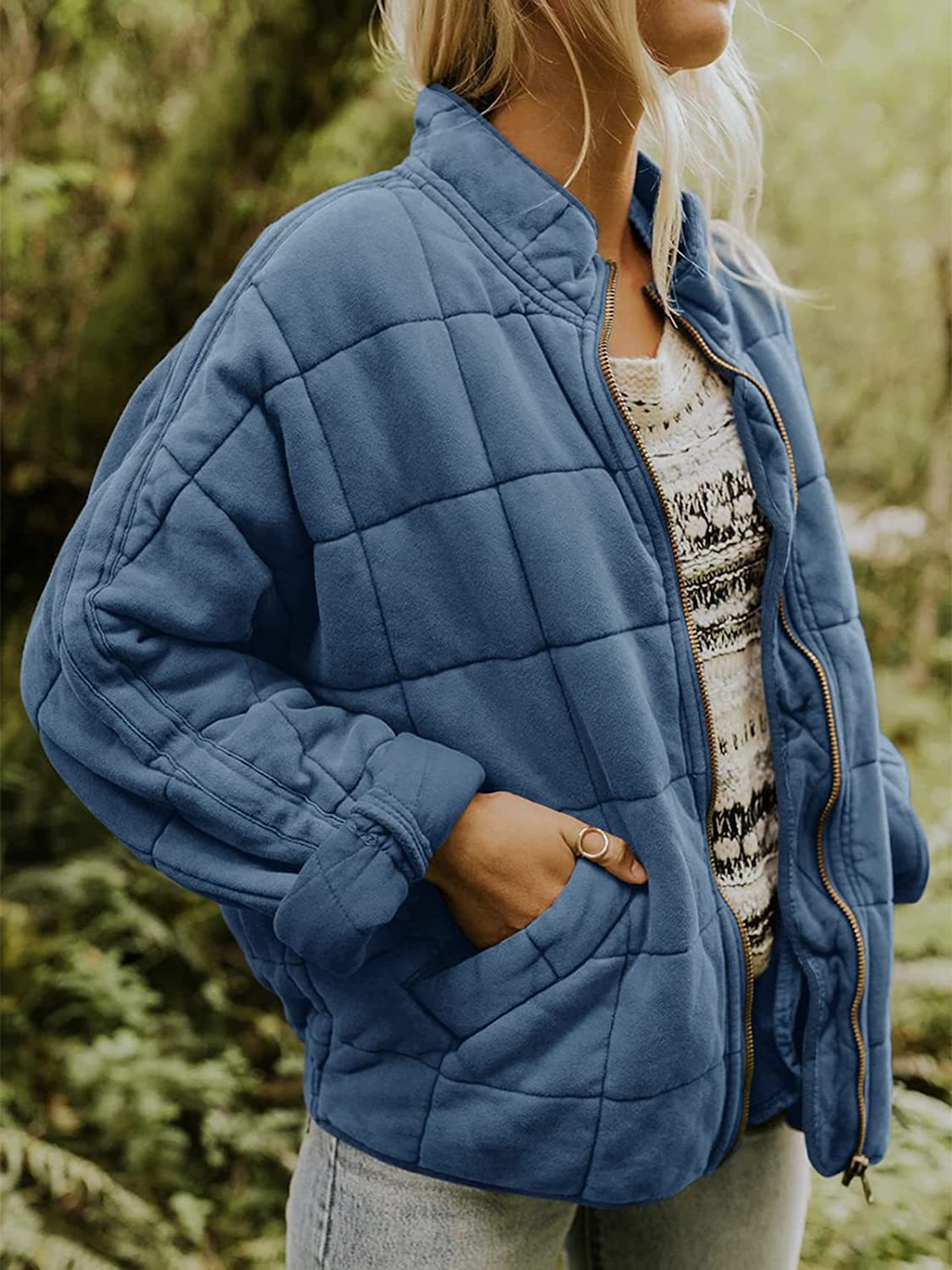 Black slim fit quilted jacket hip-length wind resistant with secure pockets for men and women