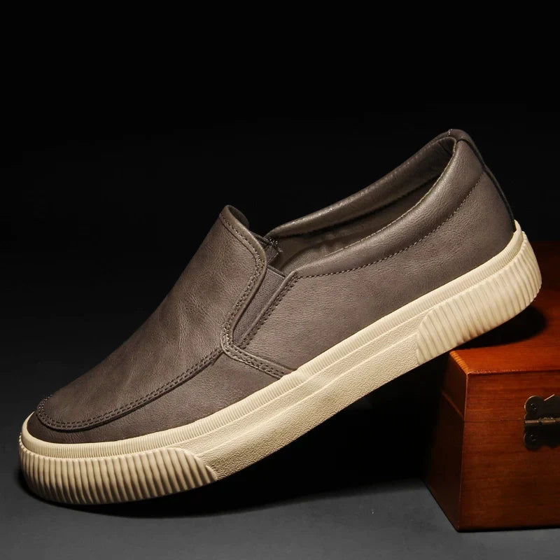 Men's brown leather slip-on shoe low-profile silhouette with stretch opening and cushioned insole