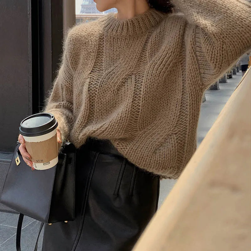Women's oversized cable knit sweater wool texture long sleeves cozy cold-weather pullover