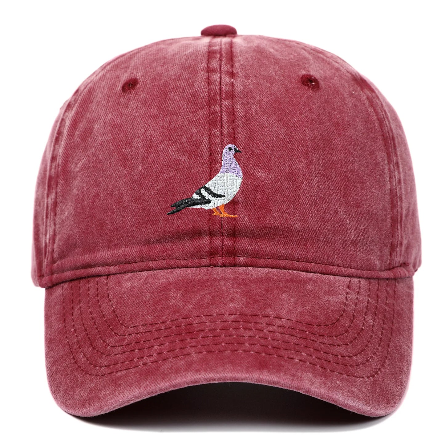 Washed cotton unisex cap in vintage tones with embroidered pigeon motif and adjustable fit