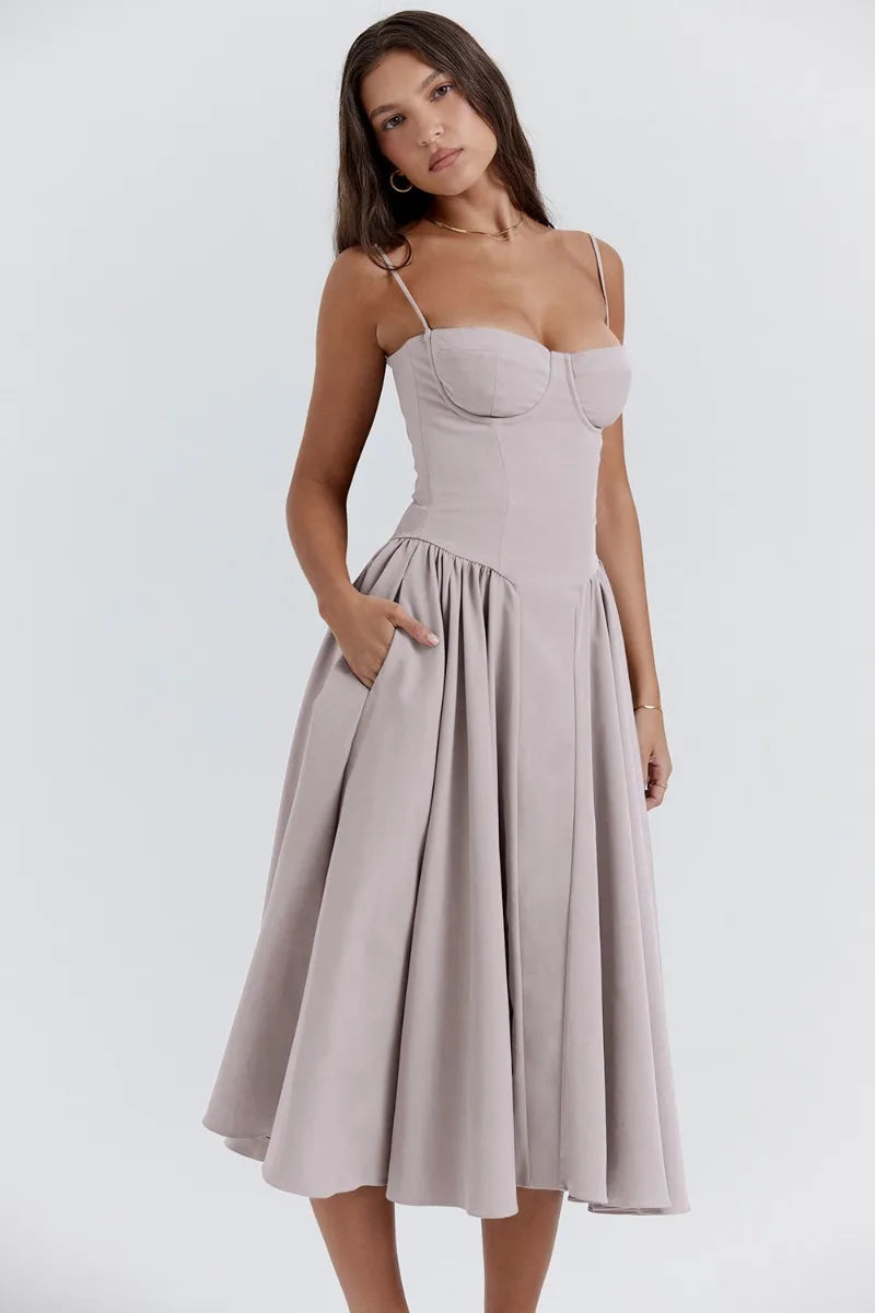 Sleeveless midi dress with corset cut waist, elegant silhouette-enhancing occasion wear for women