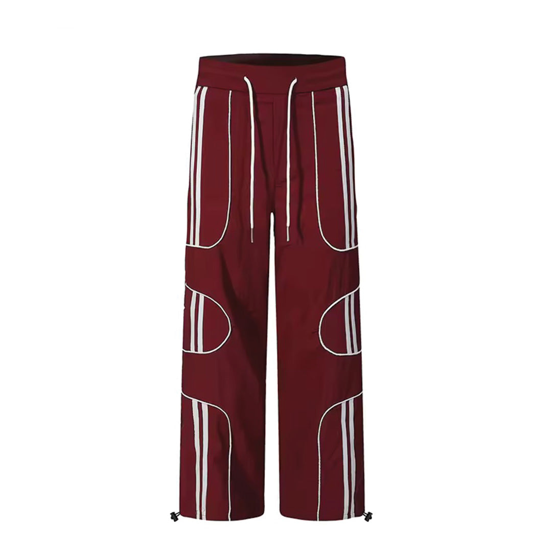 Women's wide-leg nylon trousers with contrast panels, drawstring waist, and voluminous wired silhouette