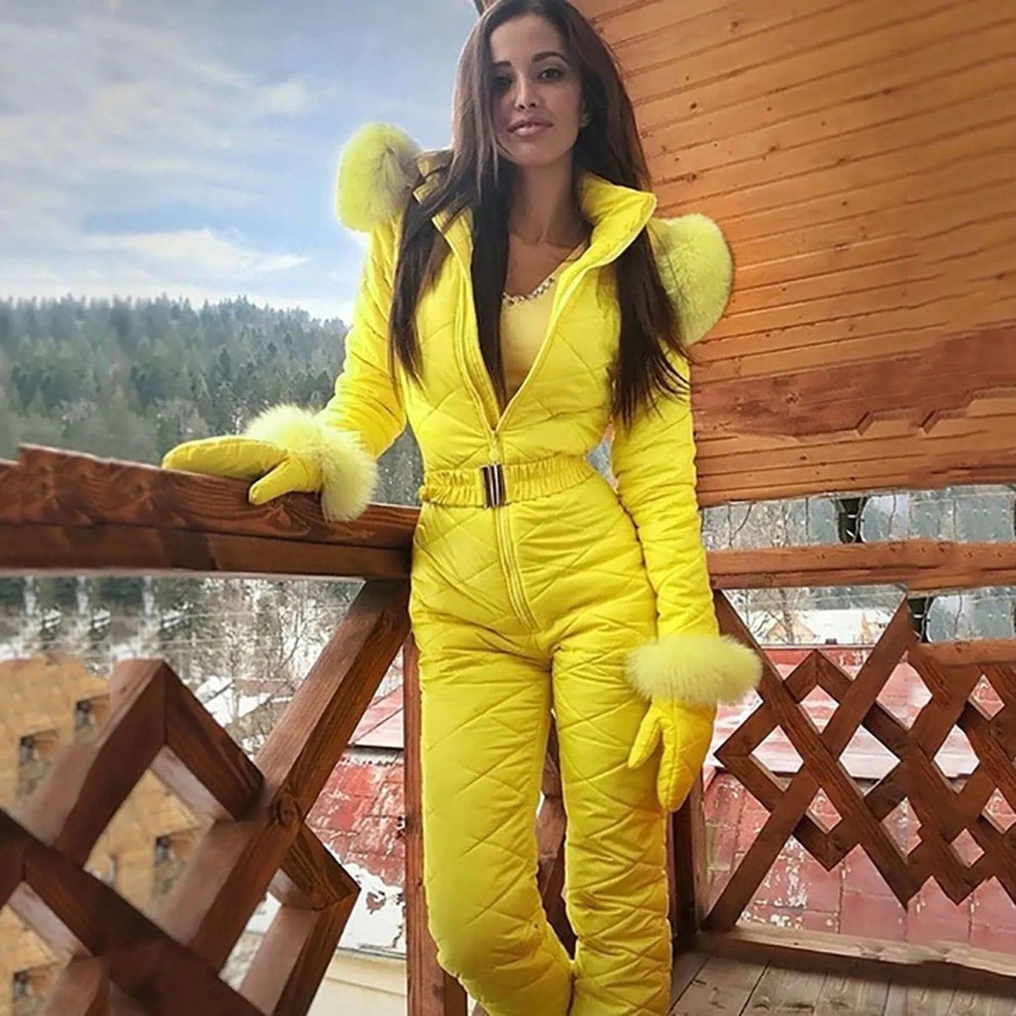 Women's elegant insulated winter jumpsuit in warm tones, slim silhouette with cold-weather protection