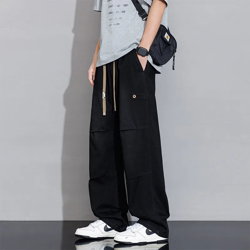 Washed denim wide-leg cargo pants unisex relaxed fit drawstring waist faded finish