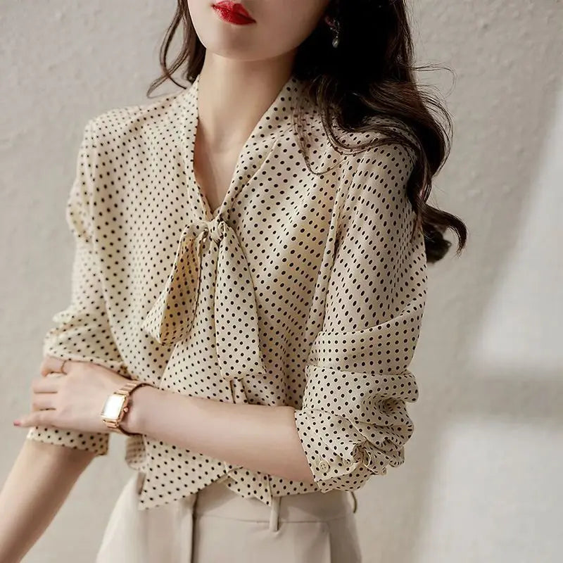 Women's lightweight breathable blouse with shawl collar and bow accent in elegant everyday style
