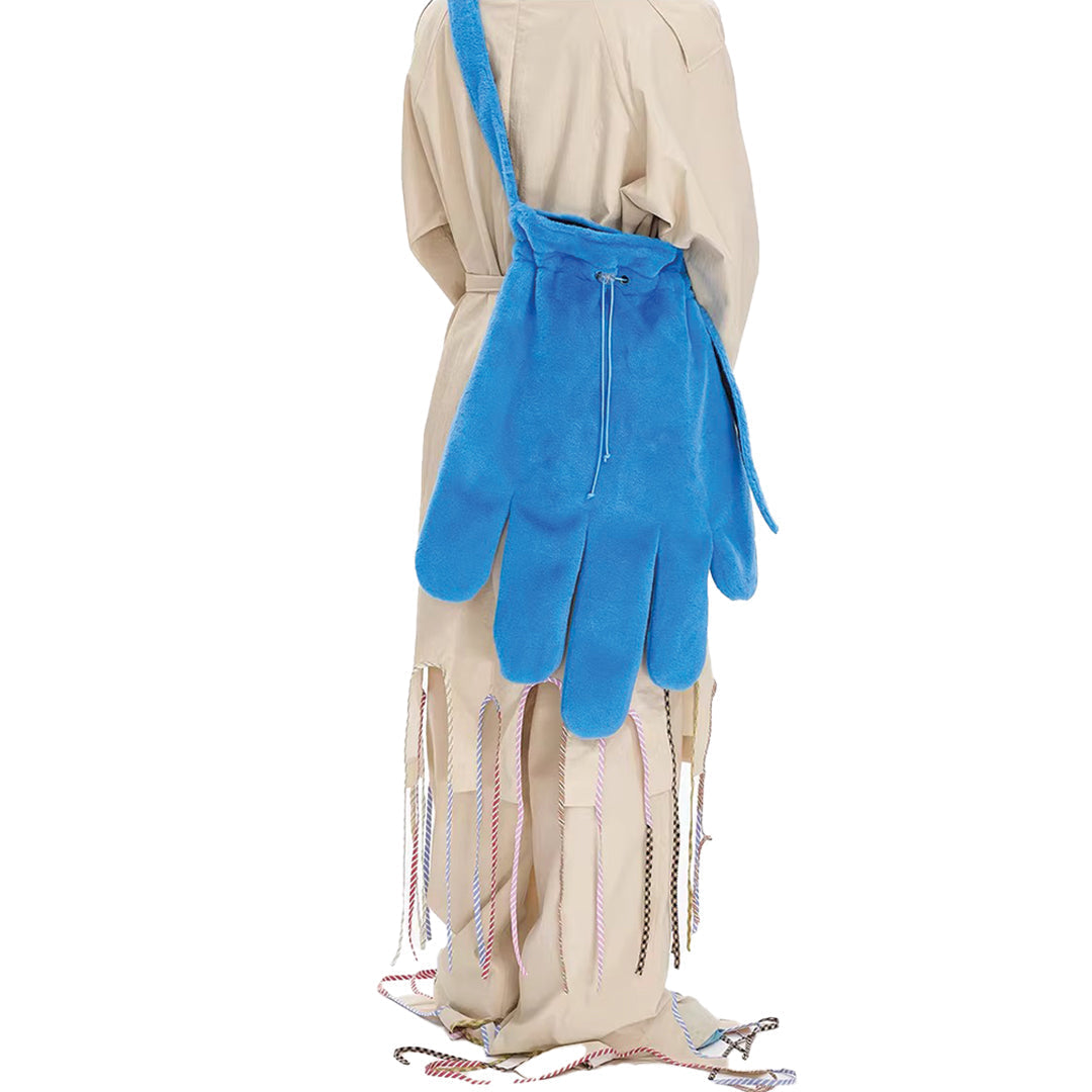 Urbann-Vibe soft fleece glove-shaped crossbody bag with faux sherpa trim, playful silhouette for city commuters