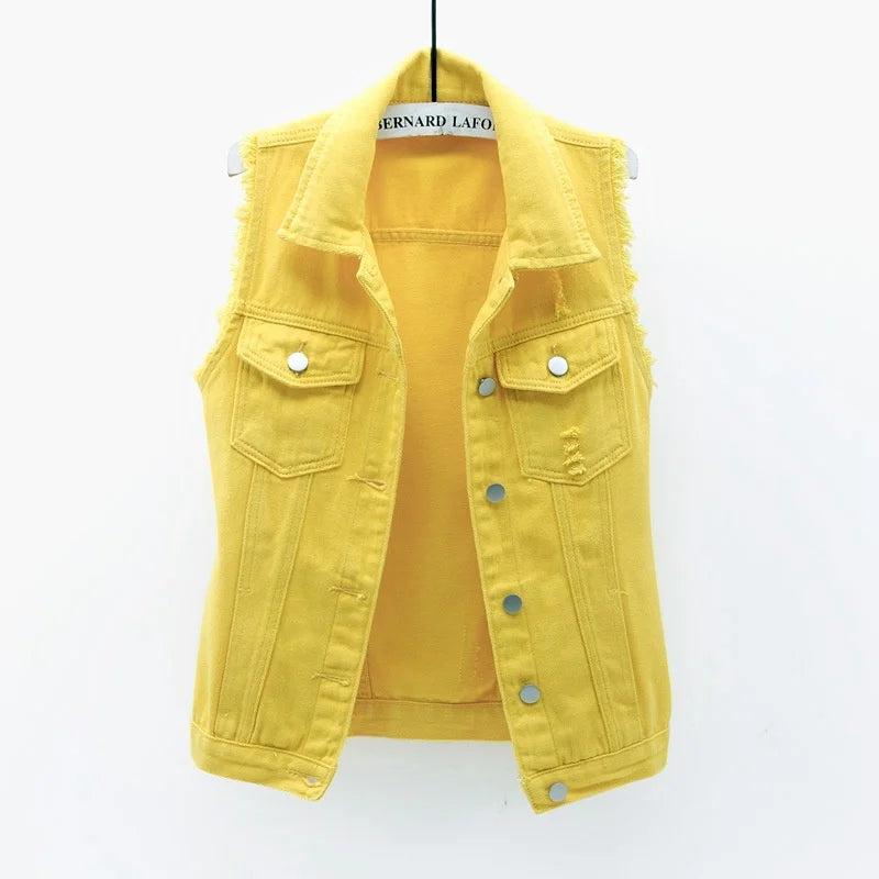 Oversized blue denim vest with distressed edges, multi-pocket design, heavyweight streetwear style