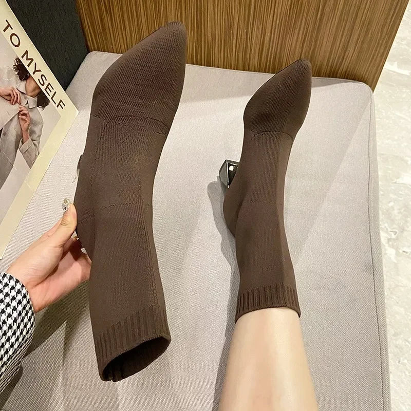 Women's black leather orthopedic sock boots with pointed toe and stretch fit for all-day comfort