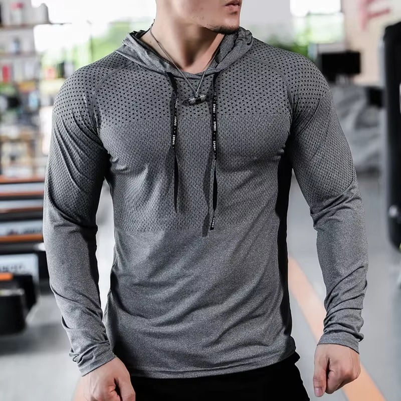 Men's gray athletic tracksuit set with zip hoodie and joggers featuring adjustable drawstrings
