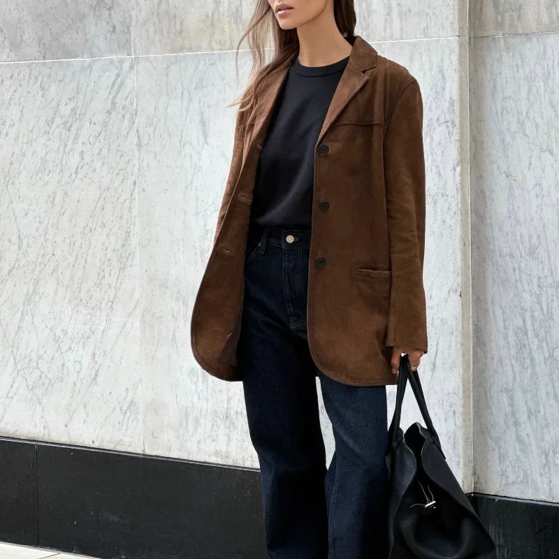 Women's loose suede jacket with premium insulation, relaxed fit, elegant timeless style for cold seasons