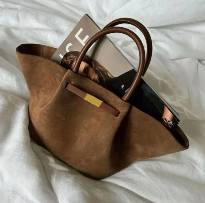Women's black crossbody tote handbag elegant design spacious interior adjustable strap versatile carry