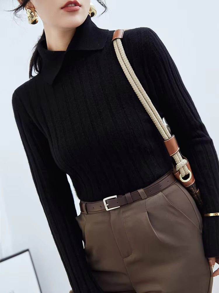 Women's classic high collar ribbed knit polo top in neutral tone, slim professional fit with structured neckline