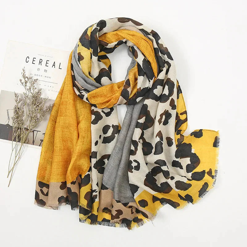 Women's long rectangular leopard print scarf, versatile all-season wrap with bold iconic pattern