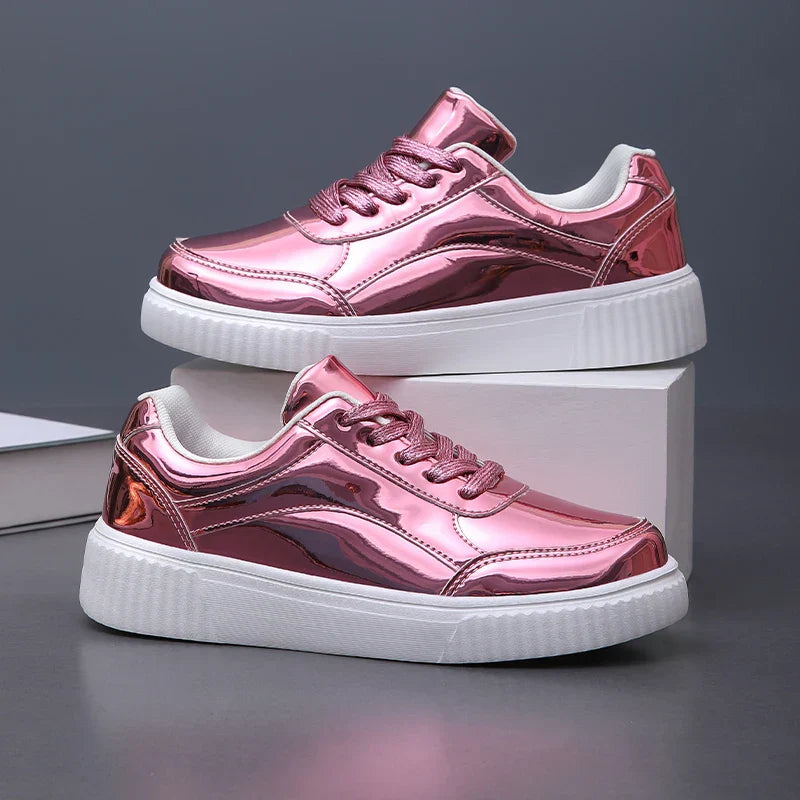 Women's metallic gold street style sneakers by Urbann-Vibe with cushioned sole and high-shine reflective finish