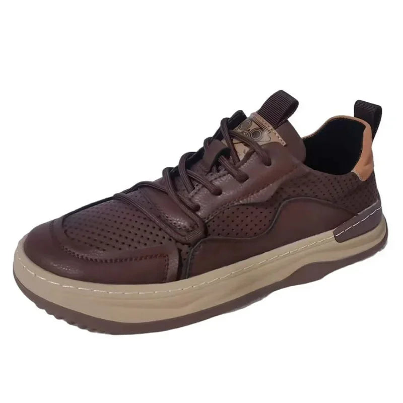 Men's white leather sneakers with breathable mesh panels and cushioned anti-slip sole for everyday wear