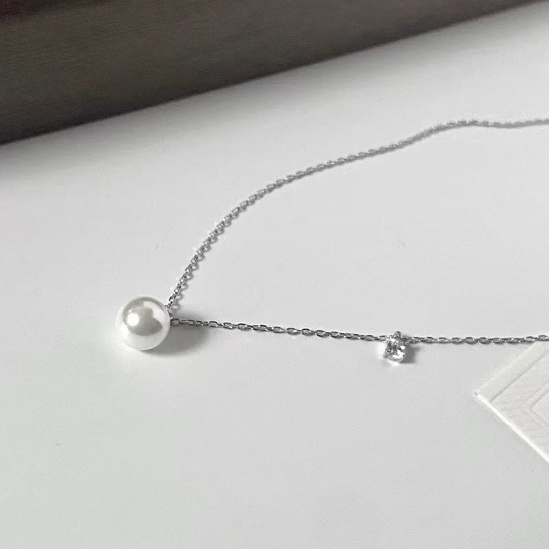 Sterling silver freshwater pearl pendant necklace with zircon sparkle, minimalist floating single pearl design