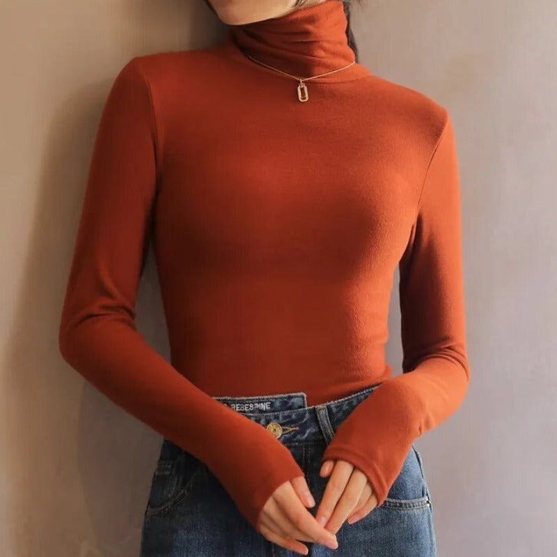 Women's velvet turtleneck sweater in luxurious cozy style with elegant lacy collar detail
