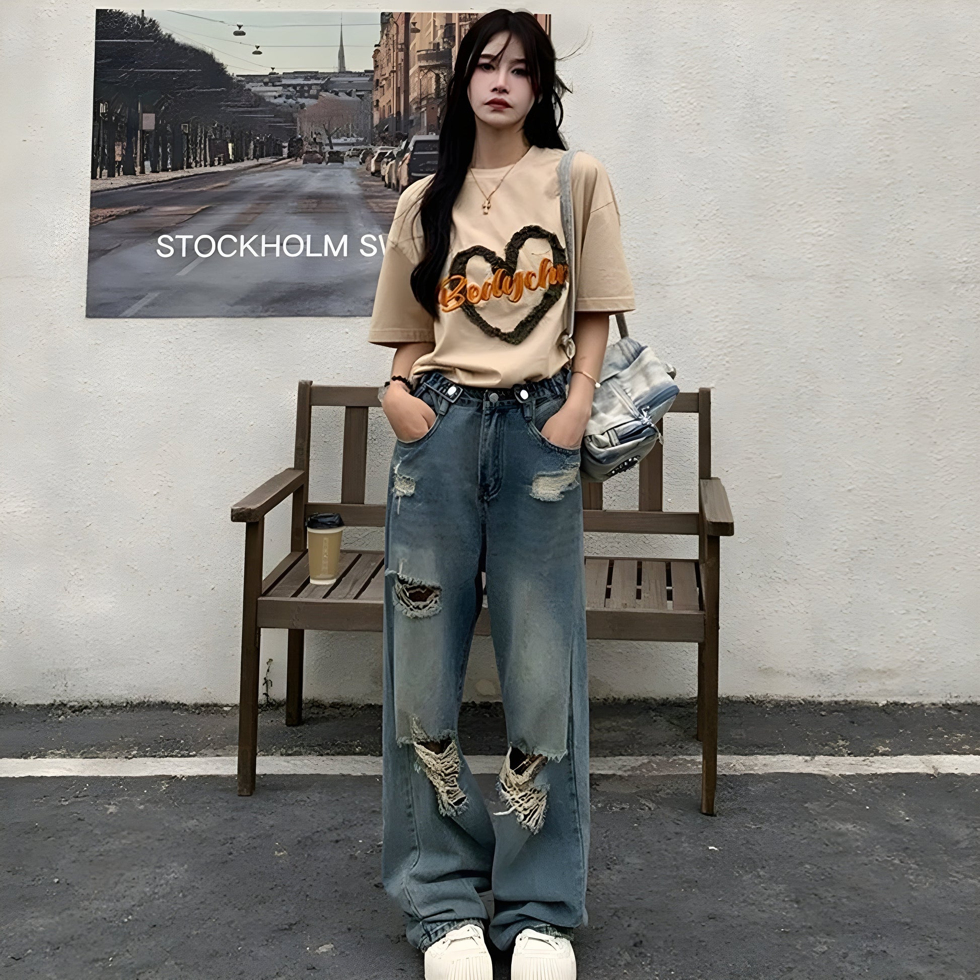 Women's distressed denim jeans high waist cinched fit oversized ripped vintage washed streetwear