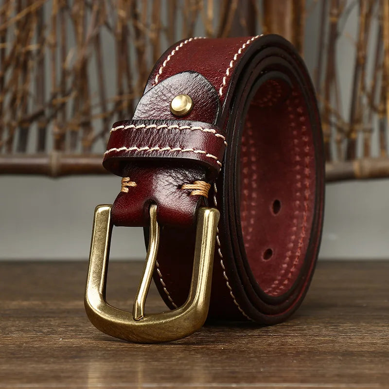 Men's full-grain buffalo leather belt in tan with contrast stitching and brass-tone buckle
