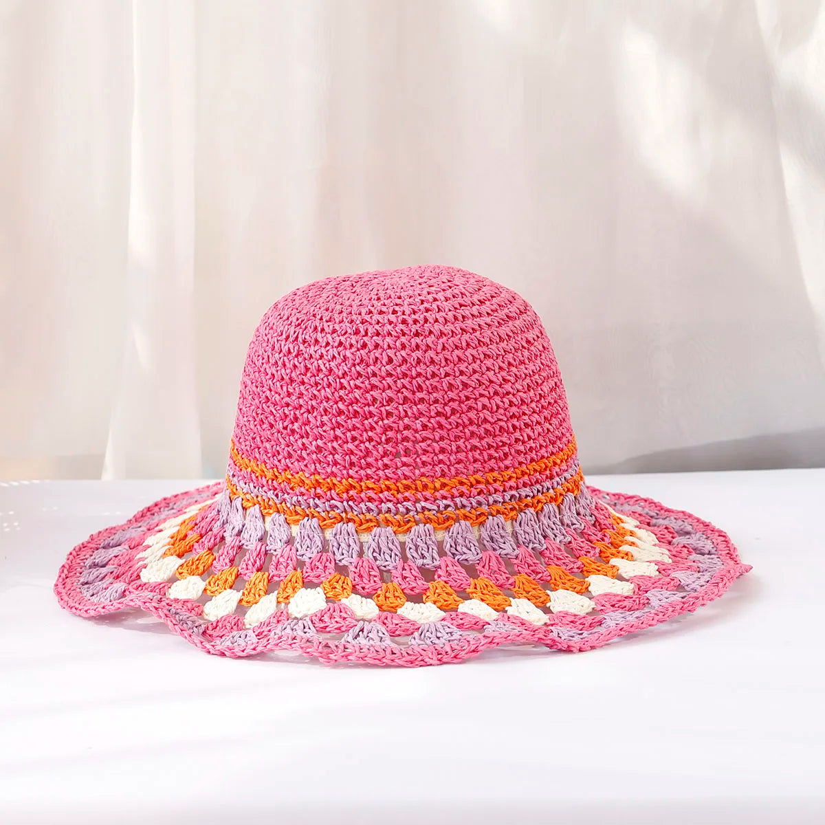 Women's boho sun hat hand-crocheted wide brim with bold color block pattern for beach