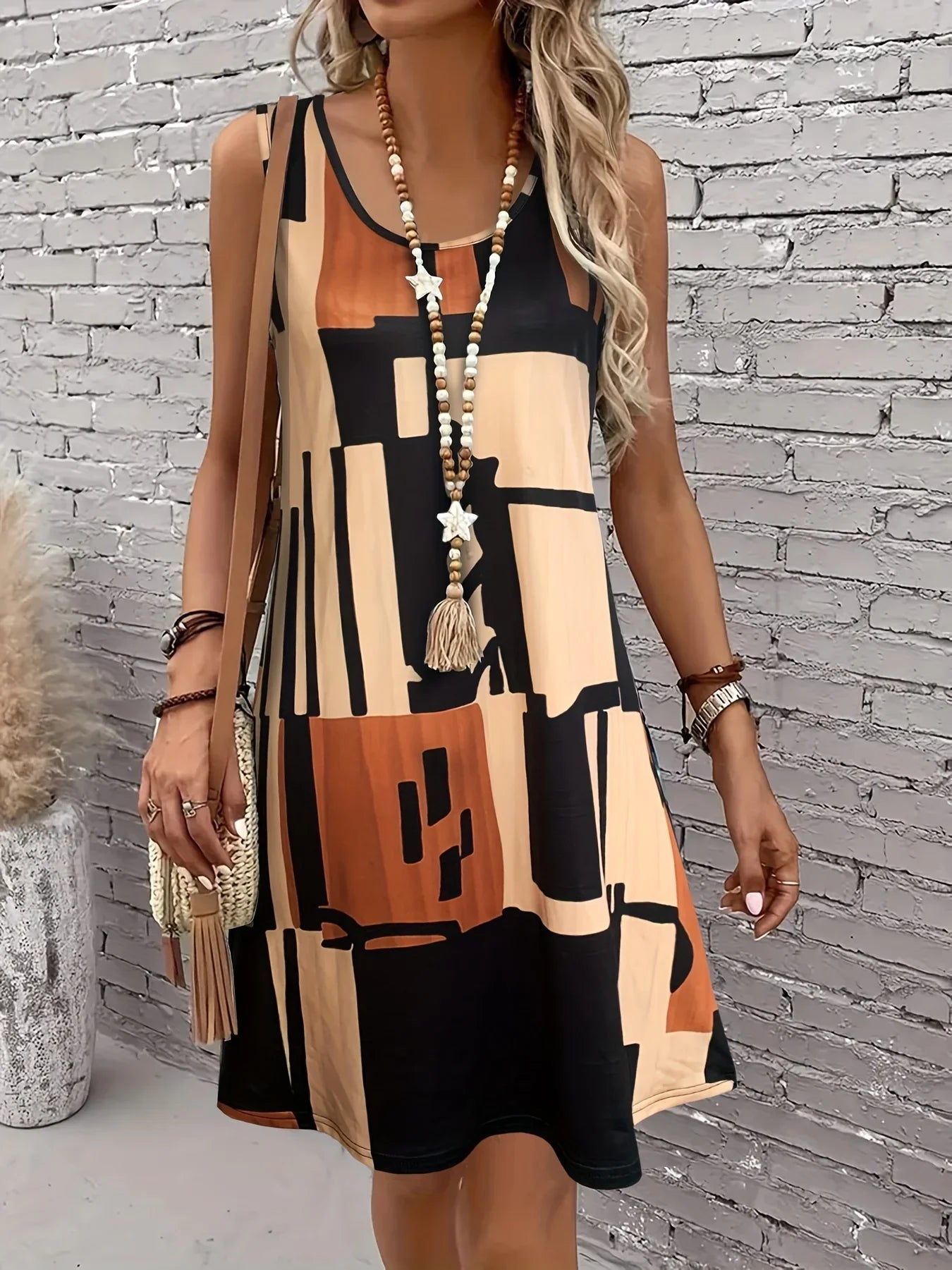 Women's sleeveless A-line dress in geometric print, lightweight breezy scoop neckline casual style